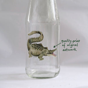 High quality vinyl, transparent, waterproof sticker shown on water bottle